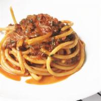 Bucatini Amatriciana · Pancetta, onions, red wine, tomato sauce.