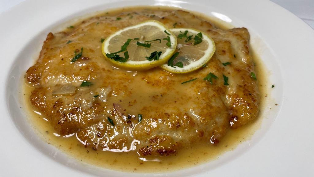 Chicken In Crosta · Crusted with aged parmigiano.