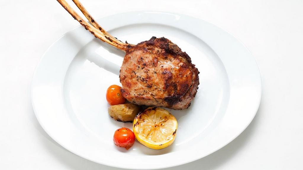 Dbl Cut Veal Chop · Roasted Potatoes and Sauteed Wild Mushrooms.