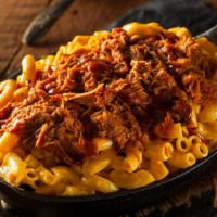 Pulled Pork Mac N' Cheese · Our famous macaroni and cheese (emphasis on the cheese) topped with our succulent well seaso...