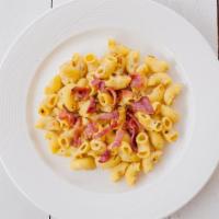 Bacon Mac N' Cheese · Our take on Mac n' Cheese - Homemade cheese sauce, lots of cheddar cheese, layered with our ...