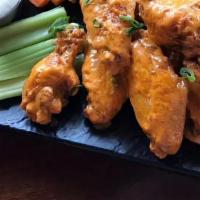 Chicken Wings · 10 Jumbo Wings.

Choice of: Thai Chili, Sweet BBQ, Teriyaki Buffalo, Garlic Buffalo, Buffalo...