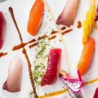 Triple Delight Sushi (12 Pcs) · Tuna, yelloetail & Salmon