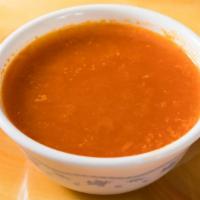 Mulligatawny Soup · Delicately spiced fresh lentil, tomato base.
