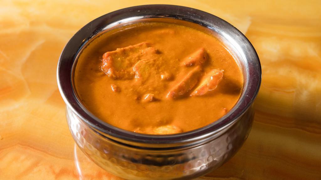 13 Butter Chicken · Tender tandoori chicken simmered with creamy tomato and onion sauce with Indian spices, come with basmati rice.