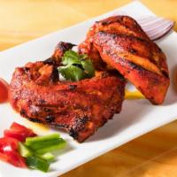 Chicken Tandoori · Marinated in yogurt, lemon juice, & Indian spices, then grilled or broiled.