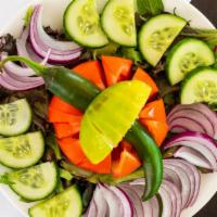 Green Salad · Indian salad of cucumber, tomatoes, onion, carrots, Bell pepper, and lettuce.