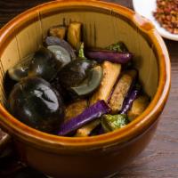 擂辣椒皮蛋 Century Egg Clay Pot · Eggplant w/ preserved thousand year egg & asian green peppers, mashed together.