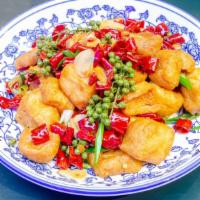 老妈油豆腐 Lao Ma Puffed Tofu · Mild. Stir fried tofu puffs, garlic, fresh peppercorn.