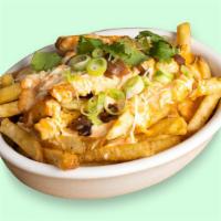 Eyes On The Cheese Fries · Crispy potatoes fried until golden- topped with cheese.