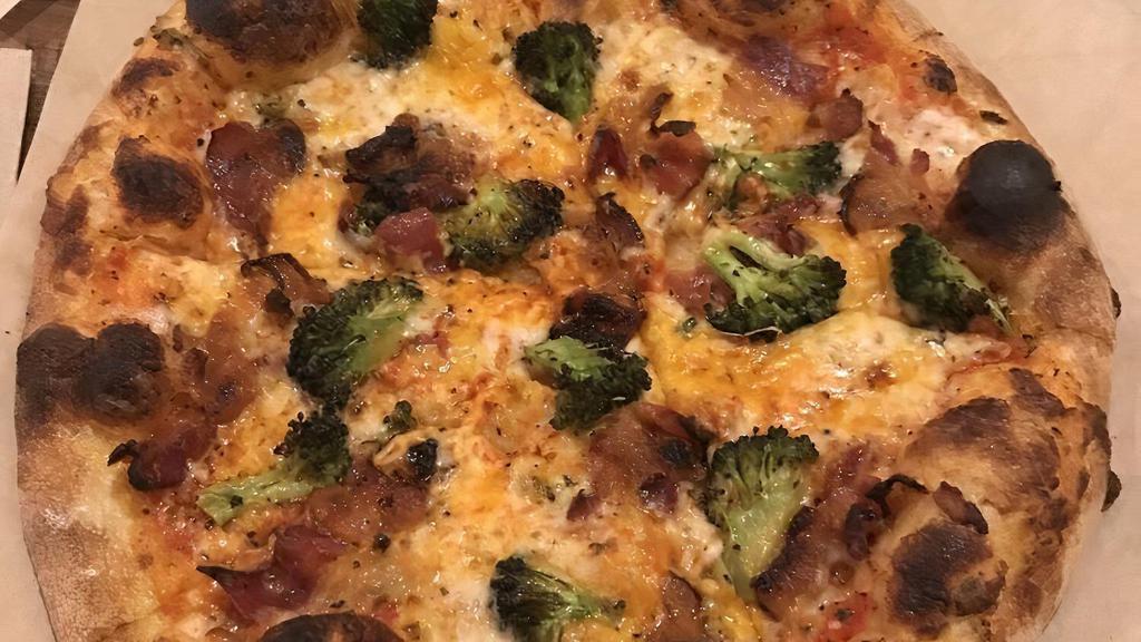Spicy Bacon Broccoli  · homemade spicy red sauce, mozzarella, cheddar cheese, grilled bacon, roasted broccoli.