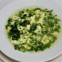 Stracciatella Soup · An egg-drop soup prepared by beating eggs and adding grated Parmesan cheese to a boiling chi...