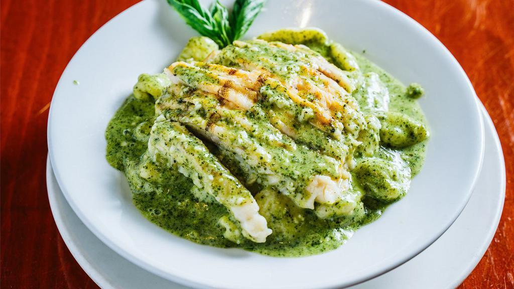 Gnocchi Al Pesto · Light, potato pasta dumplings, served in a homemade pesto sauce made from basil, garlic, pine nuts, olive oil and Parmesan cheese.