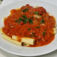 Penne Alla Filetto · Penne or rigatoni pasta served in a sauce made with fresh tomatoes, olive oil, garlic, onion...