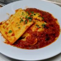 Lobster Ravioli With Marinara Sauce · Ravioli filled with a mixture of seasoned ricotta cheese and lobster. Served over a homemade...