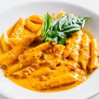 Penne With Vodka Sauce · Pasta with a homemade vodka sauce with a smooth, creamy marinara and sauteed onion sauce wit...