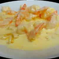 Fettuccine With Shrimp Alfredo · Fettruccini with a clasic Alfredo sauce of heavy cream, butter, Parmesan cheese and fresh sh...