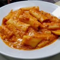 Rigatoni With Vodka Sauce · Pasta with a homemade vodka sauce with a smooth, creamy marinara and sauteed onion sauce wit...