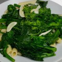 Penne With Broccoli Rabe · Penne with sauteed broccoli rabe in a light olive oil and garlic sauce.
