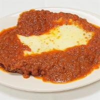 Chicken Parmigiana · Lightly breaded and fried chicken breast, baked with tomato sauce and mozzarella cheese. . S...
