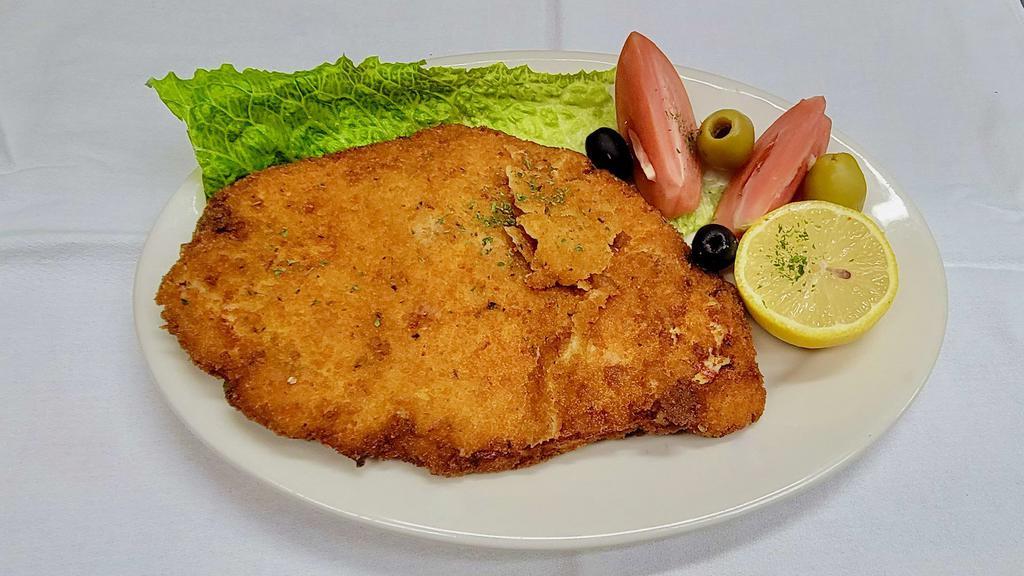 Chicken Milanese · Thin chicken cutlets, lightly breaded and fried, with fresh lemon on the side. Served with choice of pasta or salad.