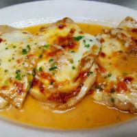 Veal Sorrentino · Veal cutlet topped with prosciutto, eggplant and mozzarella cheese, then browned in a Marsal...
