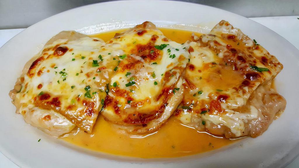 Veal Sorrentino · Veal cutlet topped with prosciutto, eggplant and mozzarella cheese, then browned in a Marsala wine, butter and mushroom sauce. Served with choice of pasta or salad.