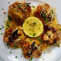 Stuffed Shrimp With Crabmeat · Jumbo shrimp stuffed with a mixture of crabmeat, chopped green pepper, seasonings and breadc...