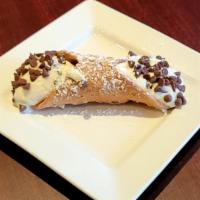 Homemade Cannoli · Little pastry tubes filled with homemade cream made of sweetened ricotta cheese.