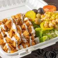 Chicken Over Rice · Served over basmati brown rice  with choice of salad, sauce, and pita. Choose up to 3 sauces...