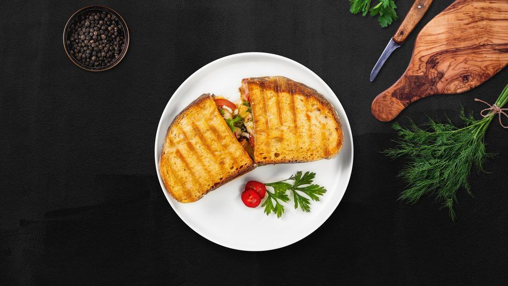 Pollo Italiana Sandwich · Italian grilled chicken, bacon, three colby jack cheese, chipotle mayo, avocado, lettuce, and tomato.