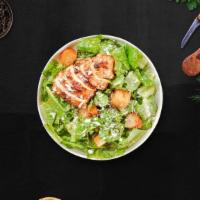 Grilled Chicken Salad · Romaine lettuce, grilled chicken, house croutons, and parmesan cheese tossed with caesar dre...