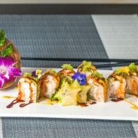 Adventure Roll · Whitefish tempura, lobster salad, and apple, soybean paper wrapped inside. Topped with yello...