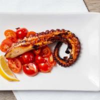 Polpo Alla Griglia · Gluten free. Grilled octopus, over cherry tomato salad.