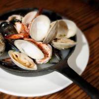 Cozze, Vongole E Gamberi · Gluten free. Mussels, clams, shrimp, garlic, wine, baked in wood burning oven.