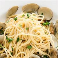 Spaghetti Vongole · Classic clams, white wine, garlic and extra virgin olive oil.