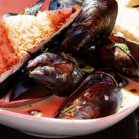 Mussels · P.E.l mussels served with garlic, white wine or a spicy tomato sauce, grilled peasant bread.