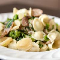 Orecchiette Foresta · Homemade sausage, sautéed mushrooms, broccoli rabe.