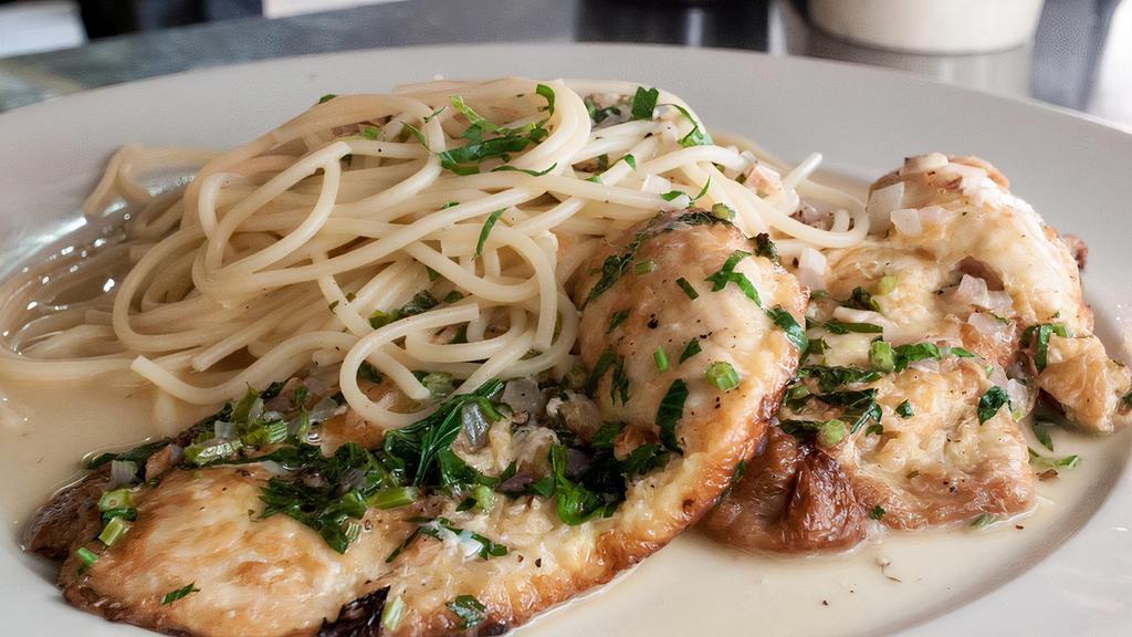 Chicken Francese · Lightly egg battered chicken breast with a lemon, garlic white wine sauce and served on a bed of linguine.