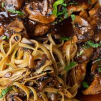 Veal Marsala · Sauteed veal scallopini with a marsala wine and mushroom sauce and served on a bed of lingui...