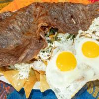 Chilaquiles · Add Con Huevo, Cecina o Bistec for an additional charge.