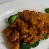 Orange Chicken (With Rice) · Crispy white meat chicken with broccoli in brown sauce.