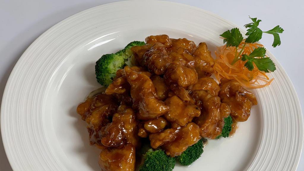 Orange Chicken (With Rice) · Crispy white meat chicken with broccoli in brown sauce.