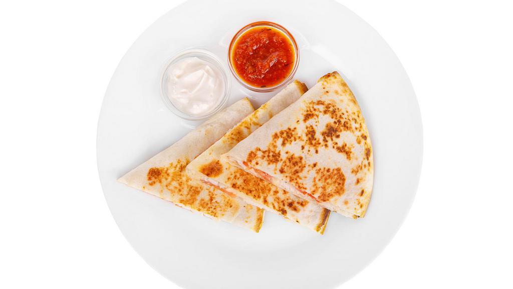 Chicken & Steak Combo Quesadilla · Fresh Quesadilla made with Grilled chicken & steak, onion, peppers, sautéed mushrooms, and a blend of mixed cheeses. Served with lettuce, tomatoes, sour cream, and salsa on the side.