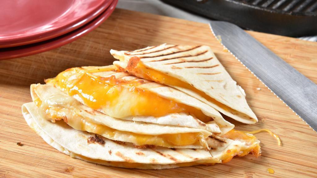 Cheese Quesadilla · Fresh Quesadilla made with a blend of Cheddar, Jack, Mozzarella, and Swiss cheeses. Served with lettuce, tomatoes, sour cream, and salsa on the side.