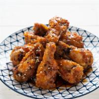 Honey Garlic Chicken Wings · Mouthwatering Honey Garlic Chicken wings fried to golden perfection. Served Hot & Crispy for...