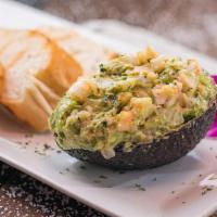 Aguacate Relleno · Stuffed avocado with option of:. Shredded chicken. • Shrimp. or • Mixed, combined with  pepp...
