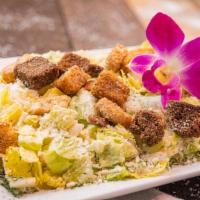 Caesar Salad · Chopped romaine lettuce, croutons, parmesan cheese and Caesar dressing