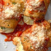 Eggplant Rollatine · Eggplant filled with ricotta, grated Romano cheese, parsley, and herbs