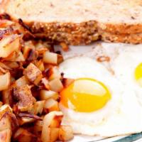 2 Eggs Served With Home Fries & Toast · 2 eggs served your way with home fries and hot toast.